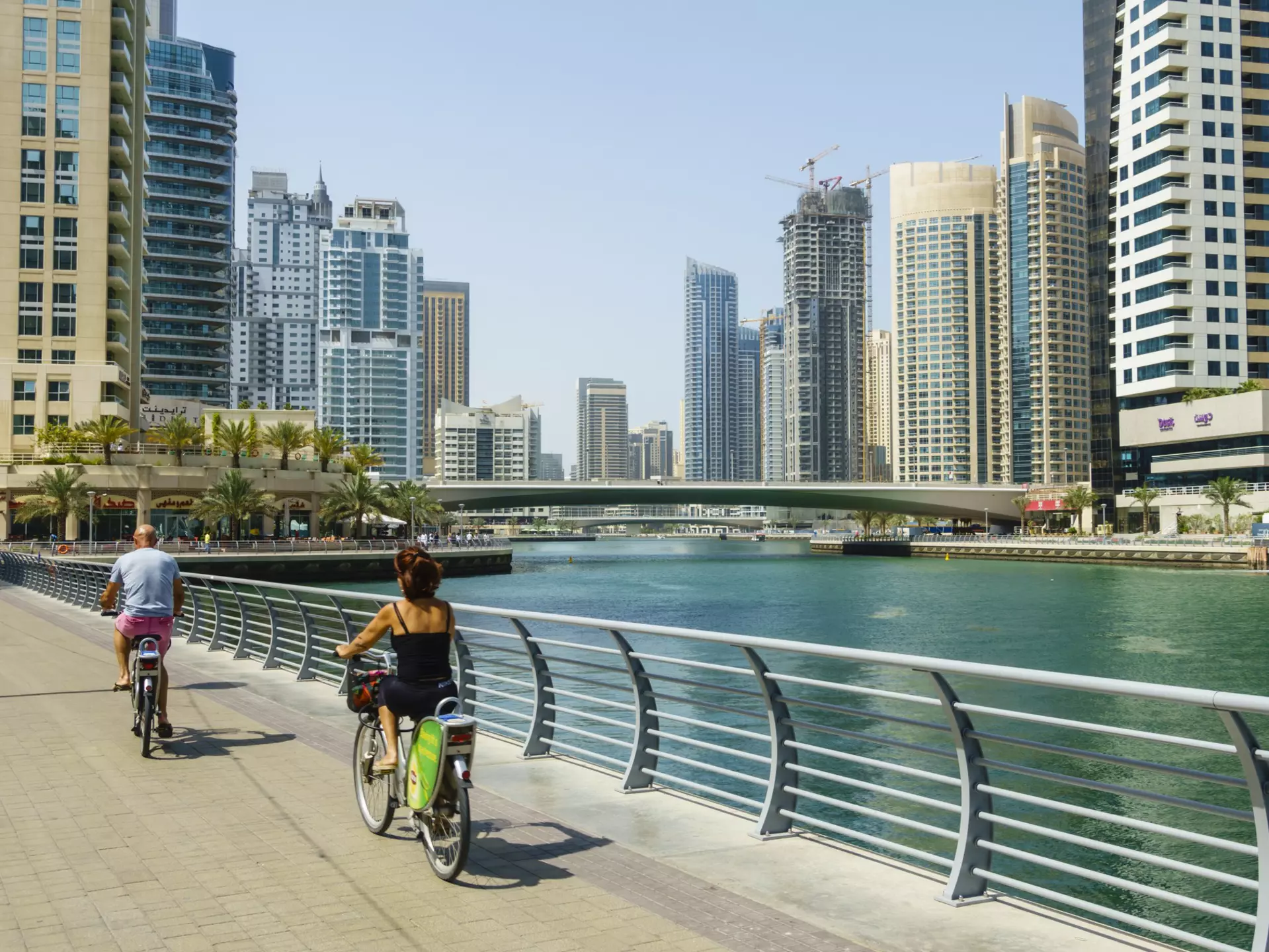 Cyclists on Marina Walk in Dubai, United Arab Emirates