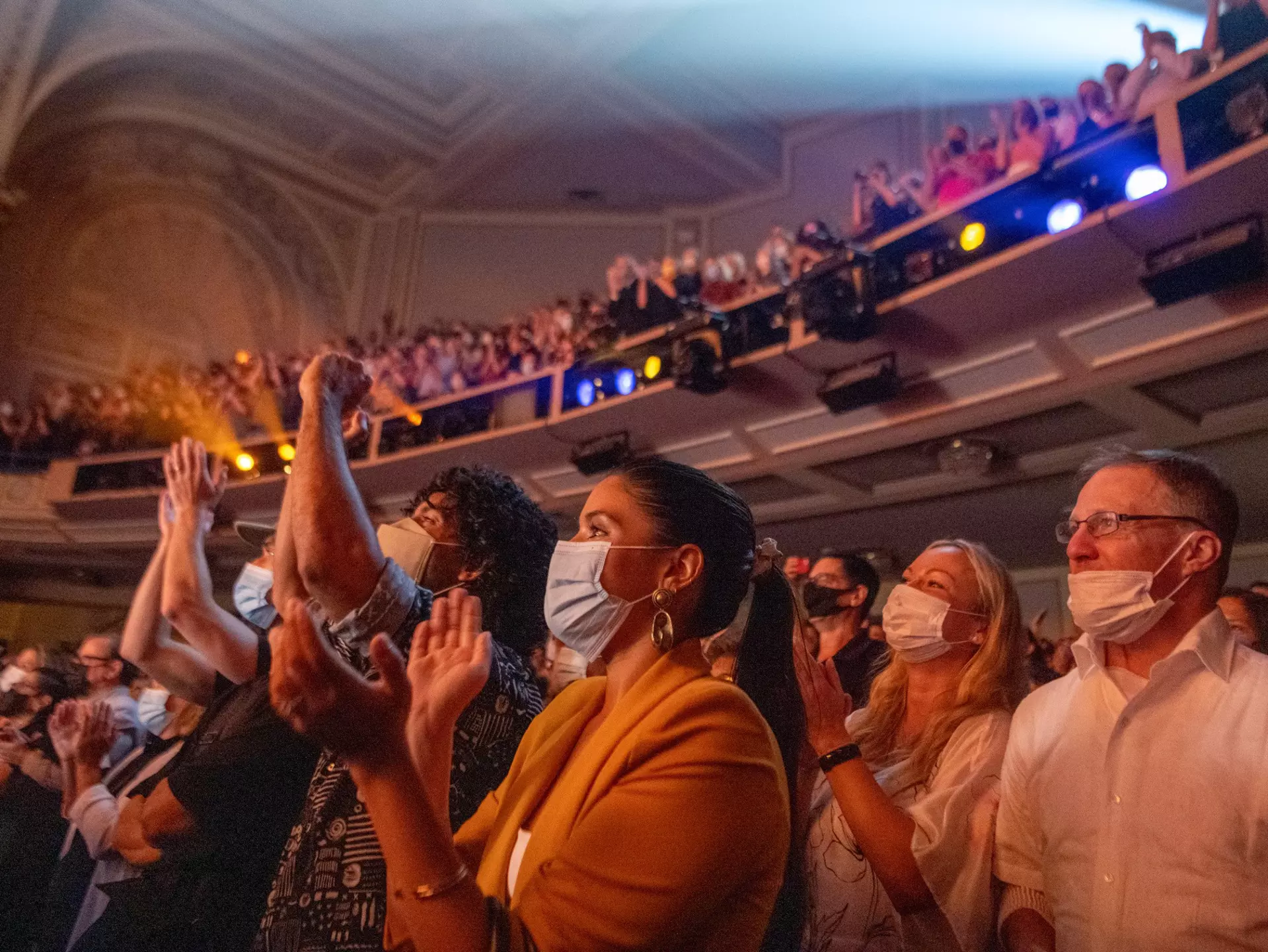 NEW YORK, NEW YORK - SEPTEMBER 14: Audience members scream and applaud during "Chicago" at Ambassador Theatre on reopening night on September 14, 2021 in New York City. "Chicago" along with three other major musicals reopened tonight after being closed...