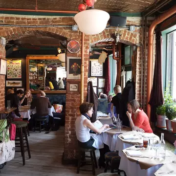 Dining at The Spotted Pig restaurant, West Village.