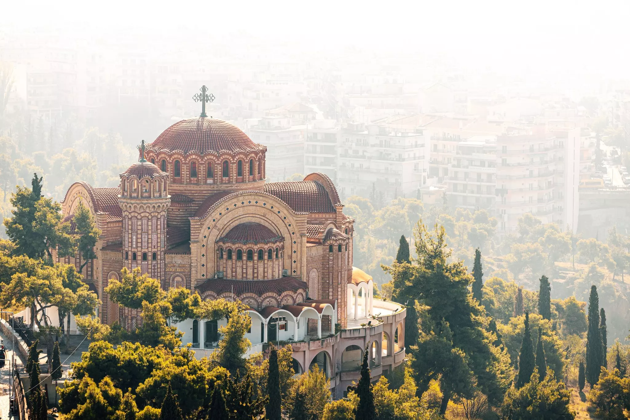 View of Greek Church of Saint Pavlos flying in the morning haze in Thessaloniki