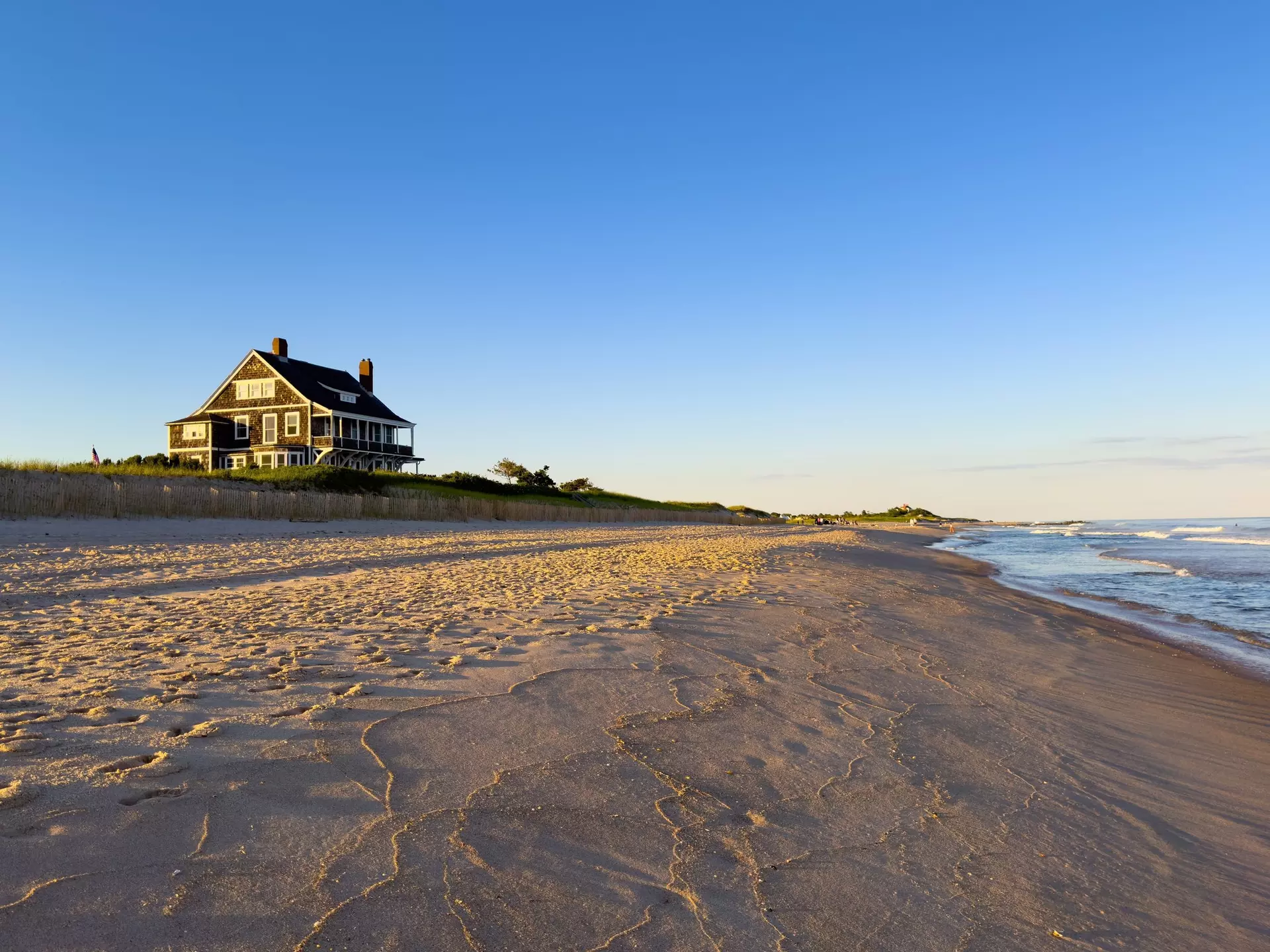 A wide stretch of quiet beach. Shutterstock