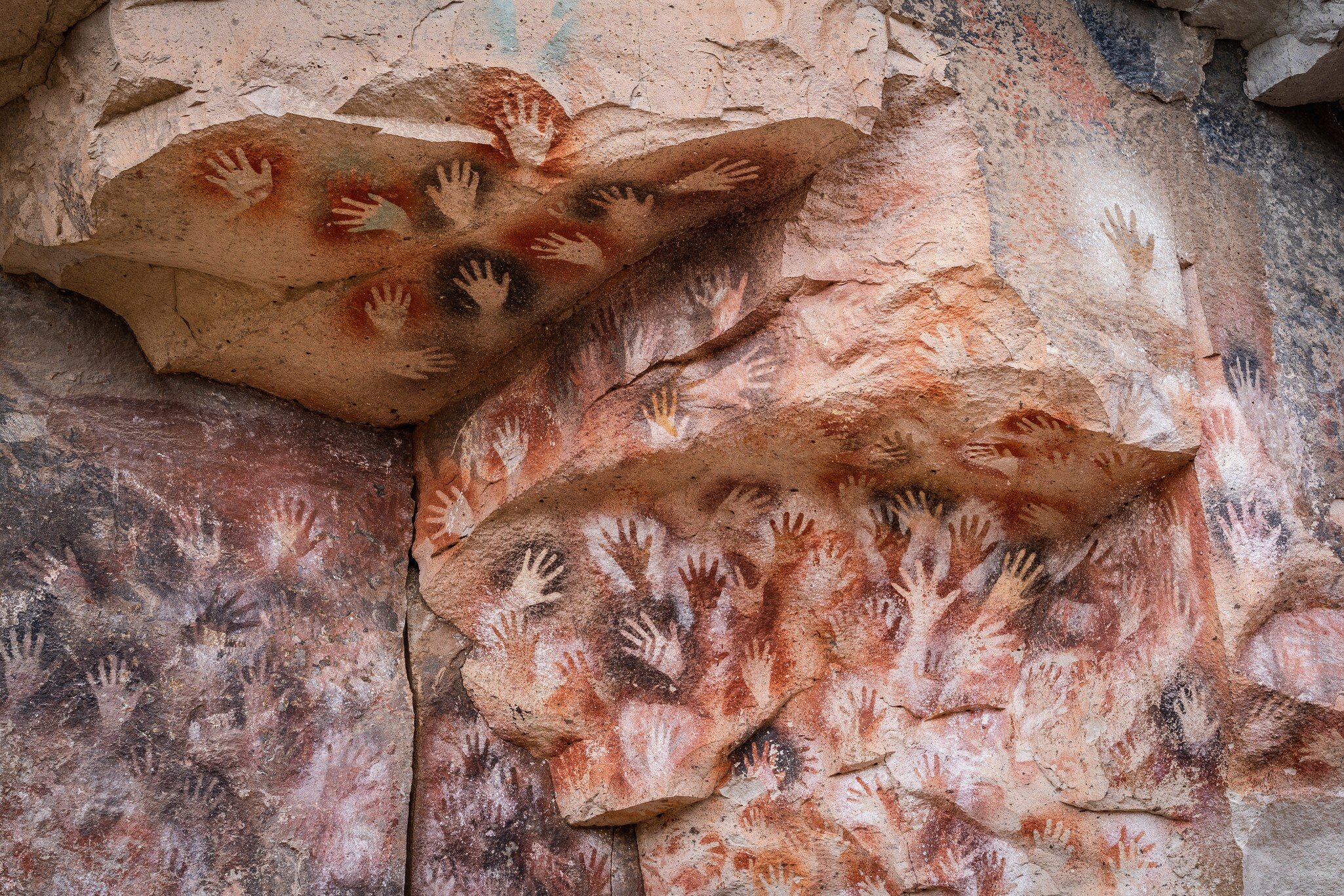 Prehistoric hand paintings at the Cave of the Hands (Spanish: Cueva de Las Manos) in Santa Cruz Province, Patagonia, Argentina. 