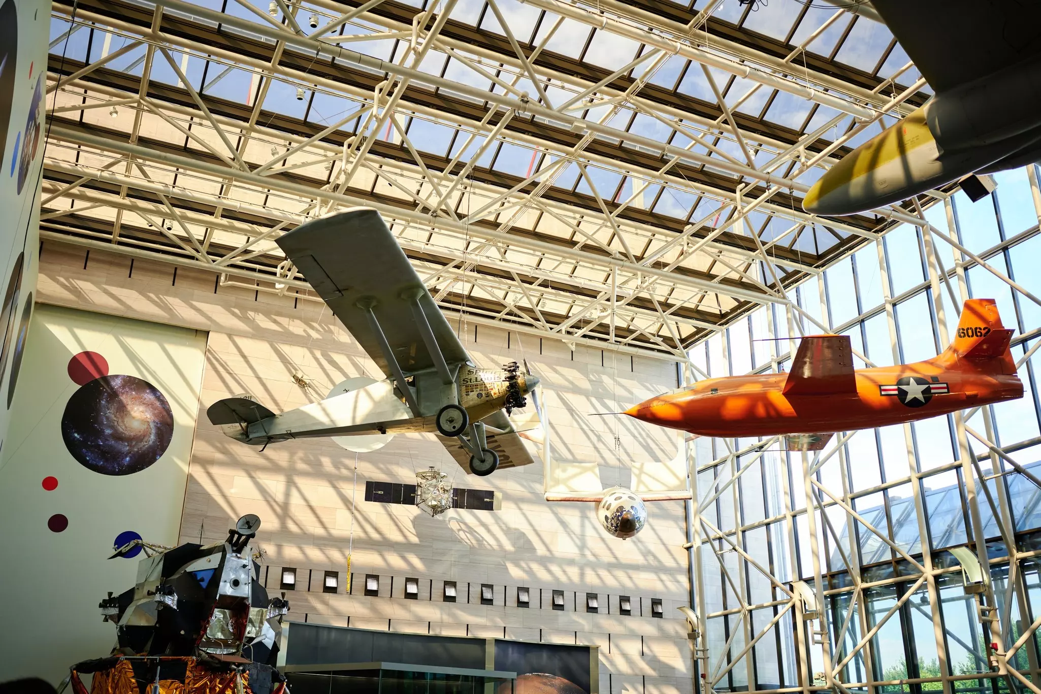 WASHINGTON, DC, USA - OCTOBER 16TH 2021: the awesome interior of The National Air and Space Museum of the Smithsonian Institution. The history of space is presented to attract children of all ages.  License Type: media  Download Time: 2022-07-27T05:35:43.000Z  User: claramonitto  Is Editorial: Yes  purchase_order:   