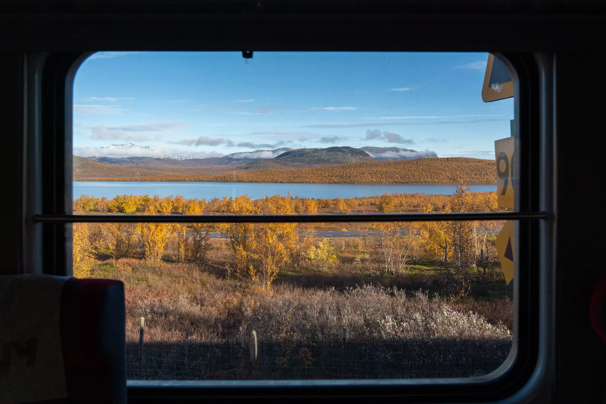 Window views of Sweden's spectacular Abisko National Park - a panoramic finale before crossing into the border to Norway © Daniel James Clarke