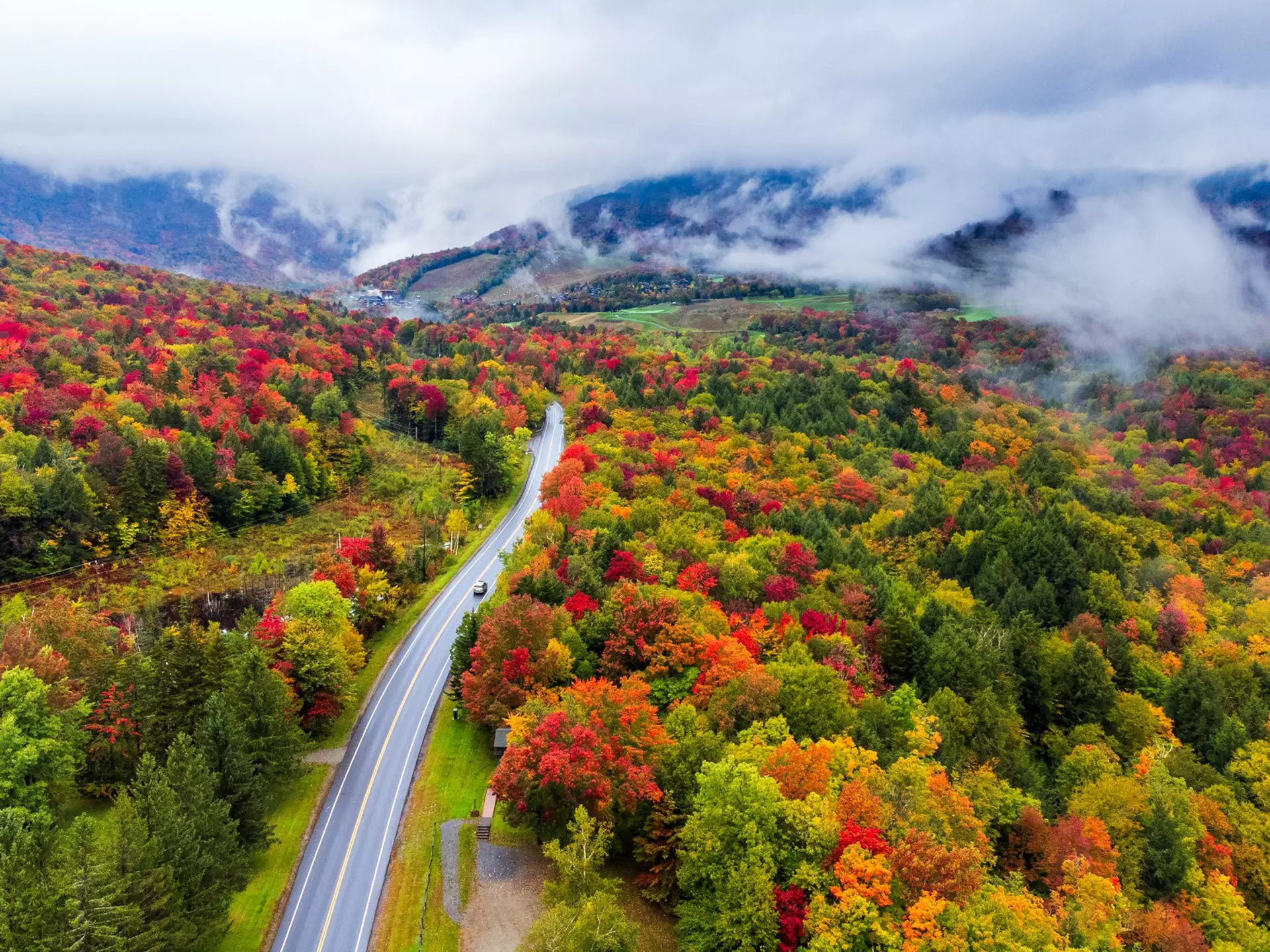 Driving through Vermont in fall. Chun Chen/500px/Getty Images