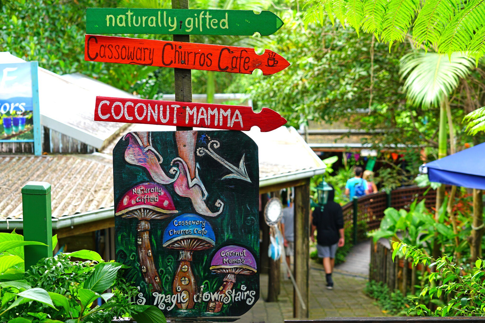 Signs at the Original Kuranda Rainforest Market, a folk art and food market located in the rainforest village of Kuranda near Cairns in Far North Queensland, Australia.