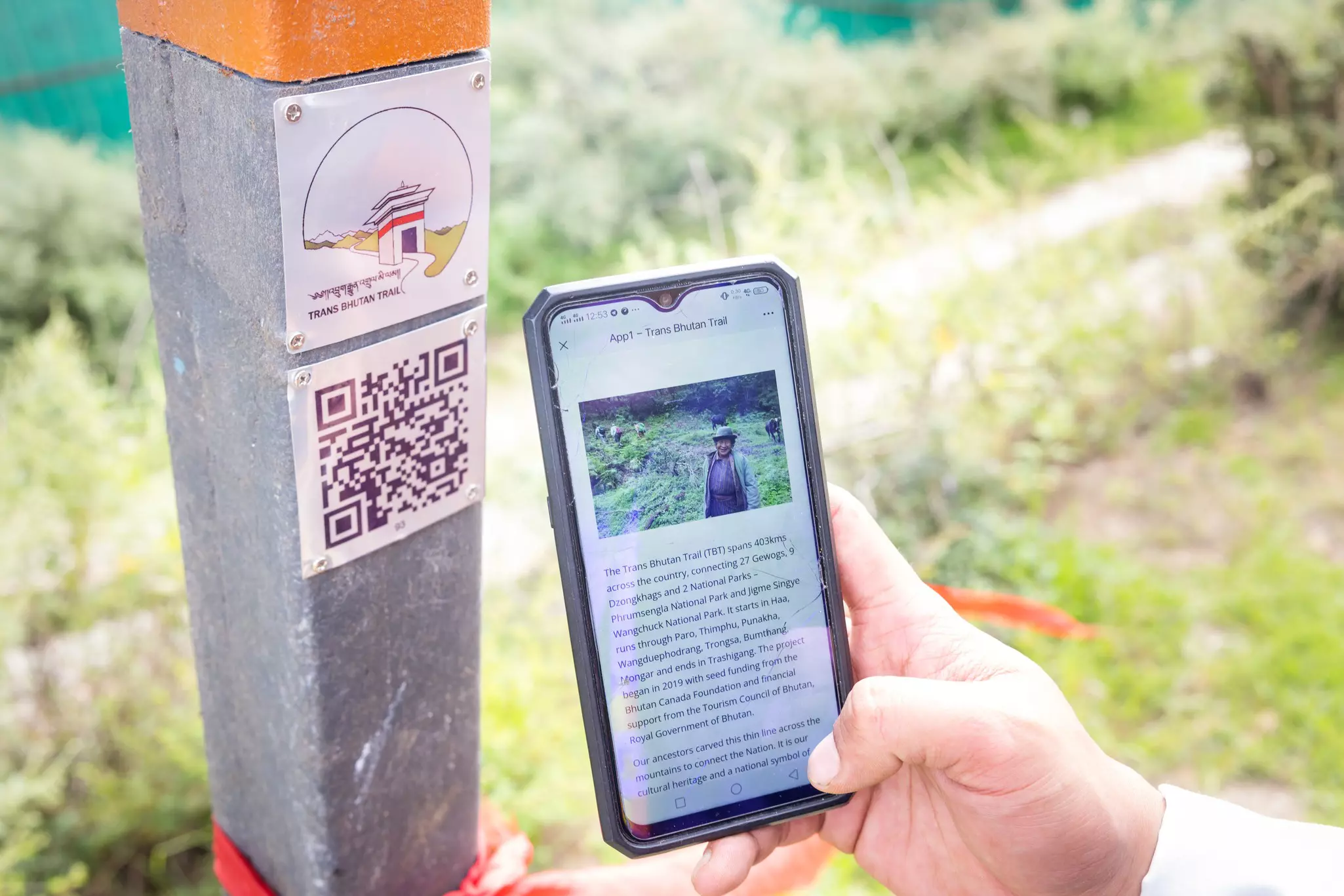 QR code trail makers along the Trans Bhutan Trail offer travelers more information about the area's history and the local environment. © Ken Spence