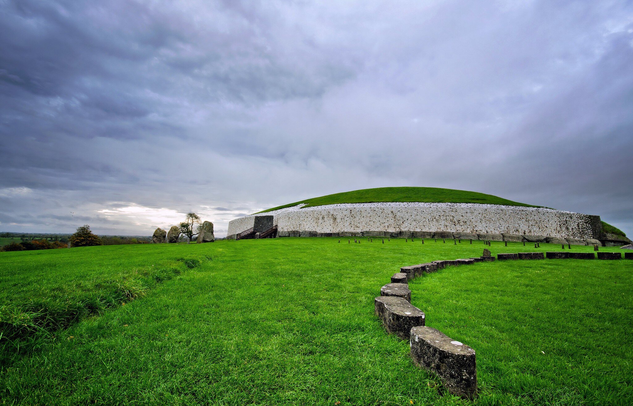 Newgrange Megalithic Passage Tomb with gray skies above