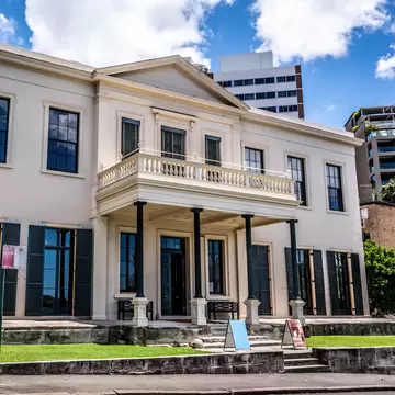 Exterior view of Elizabeth Bay House with an old Australian colonial regency architecture style in Sydney NSW Australia.