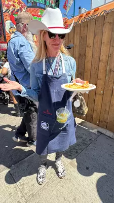 Calgary Stampede Caroline Trefler midway food July 2026.