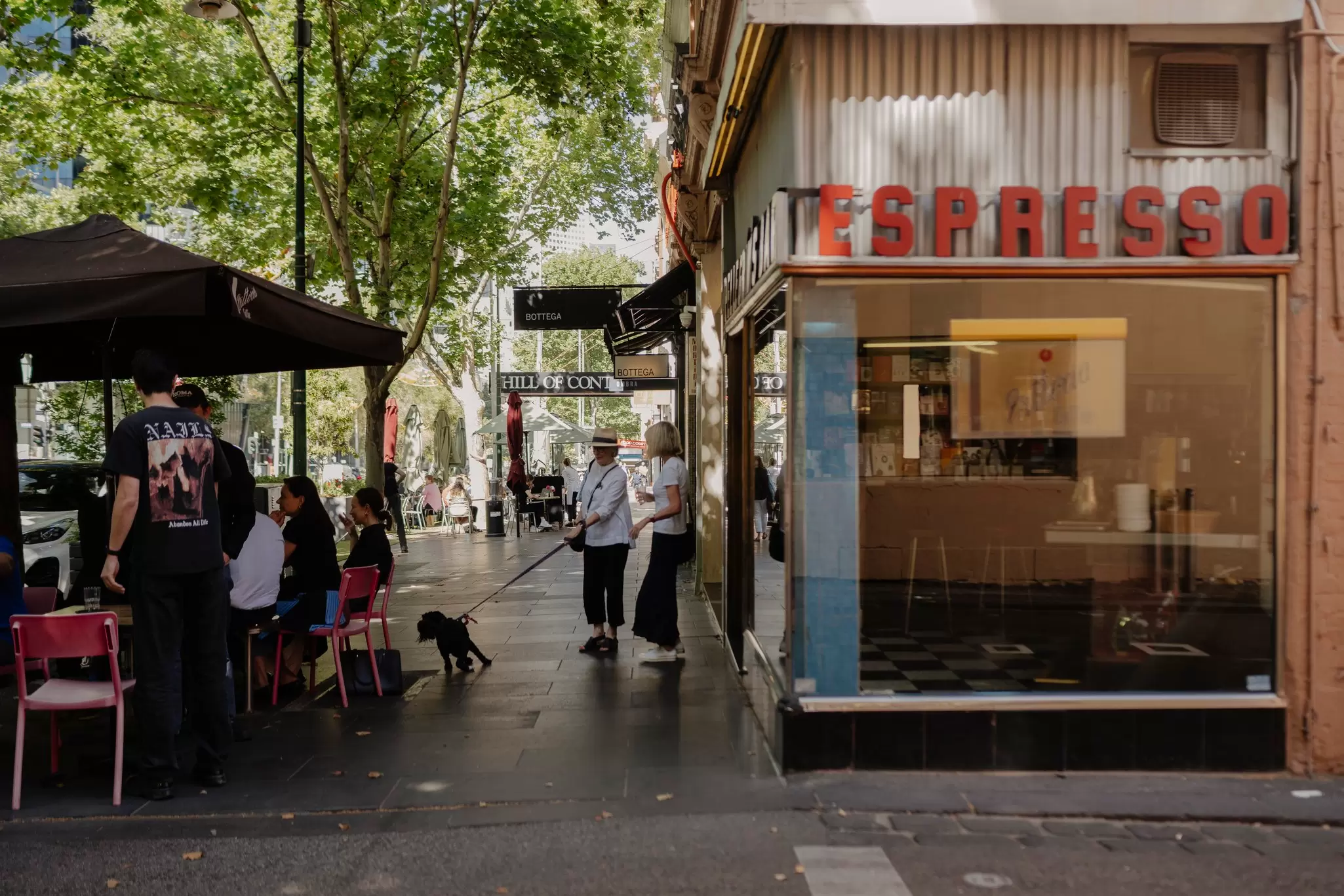 People outside Pellegrini's, an iconic espresso bar and coffeehouse in central Melbourne