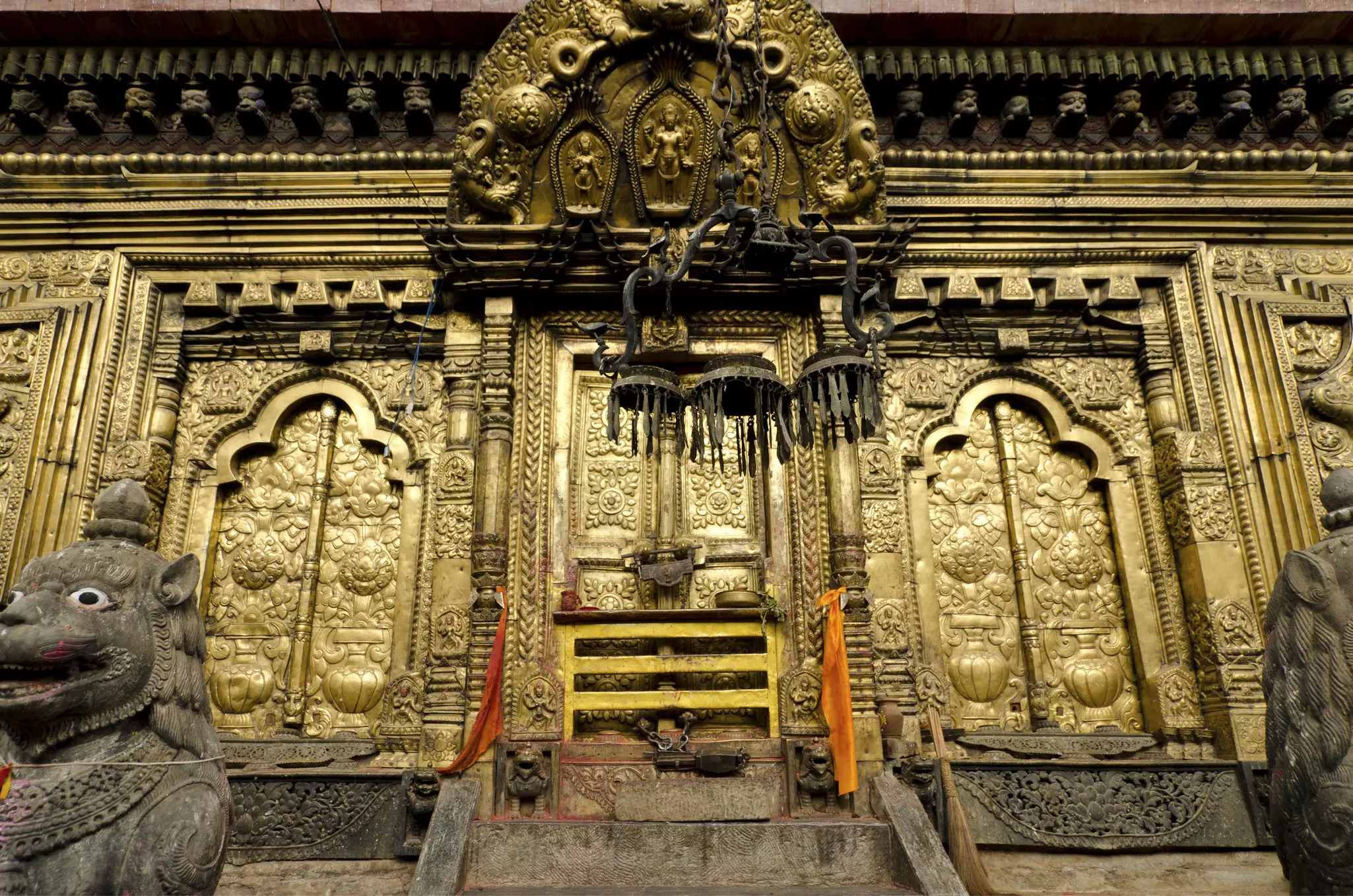A gold plated metal door of a temple
