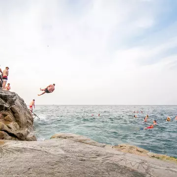People diving into the sea at the Forty Foot, Dublin - 40 Foot. 