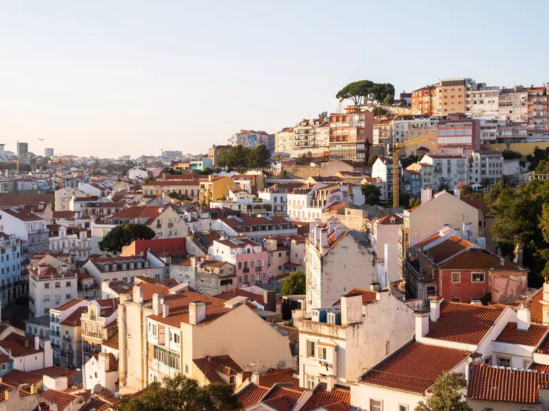 Hilltop pastel colored villages during sunset.