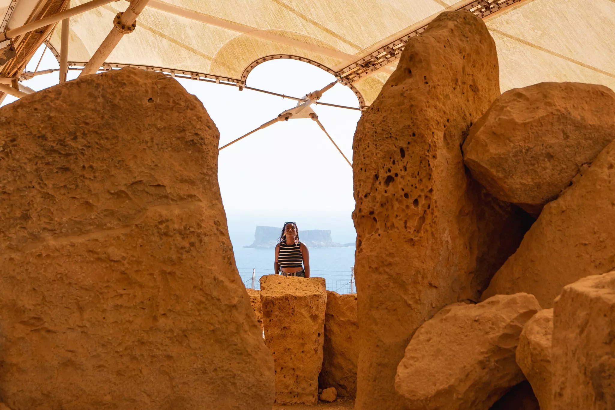 Jacklynn admiring the megalithic Ħaġar Qim Archaeological Site