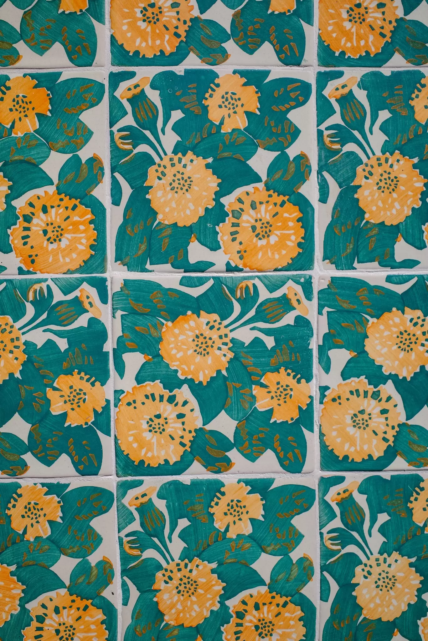 The blue-and-yellow marigold tiling on the exterior of Casa Vicens, built by architect Antoni Gaudí.