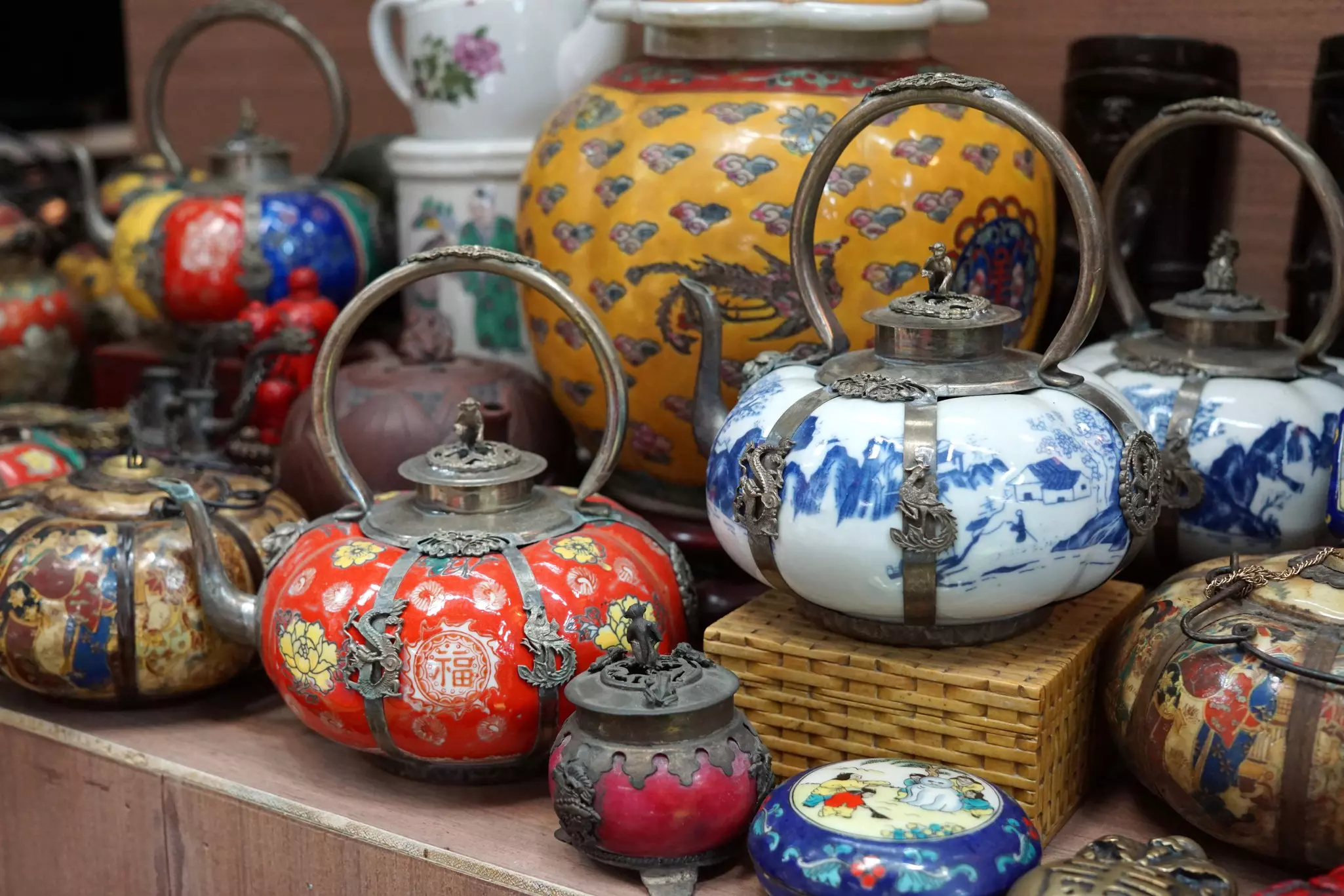 Traditional teapots in a variety of decorative styles at Chatuchak Weekend Market