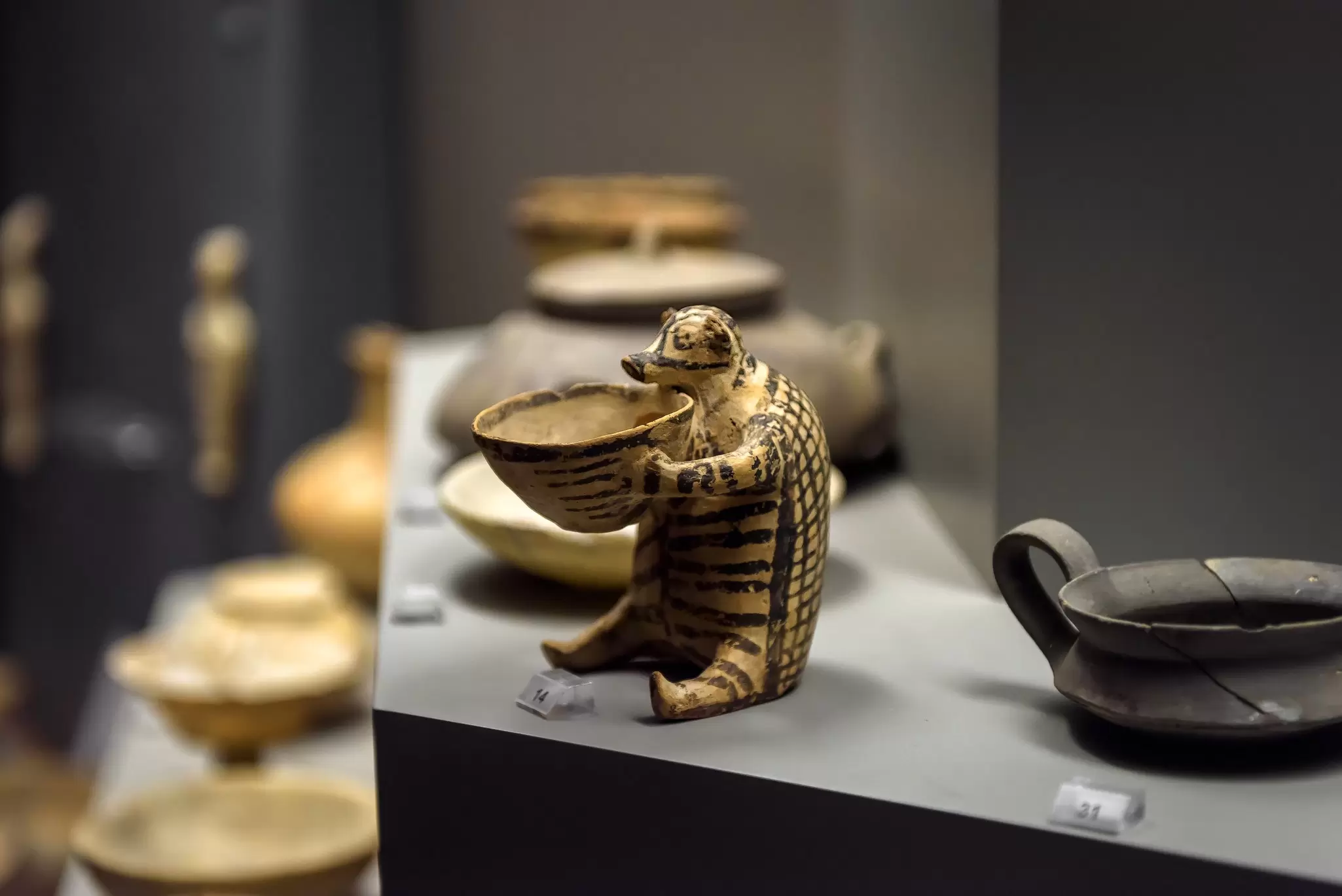 Close-up of a ceramic vase-like hedgehog at the National Archaeological Museum in Athens, Greece.
