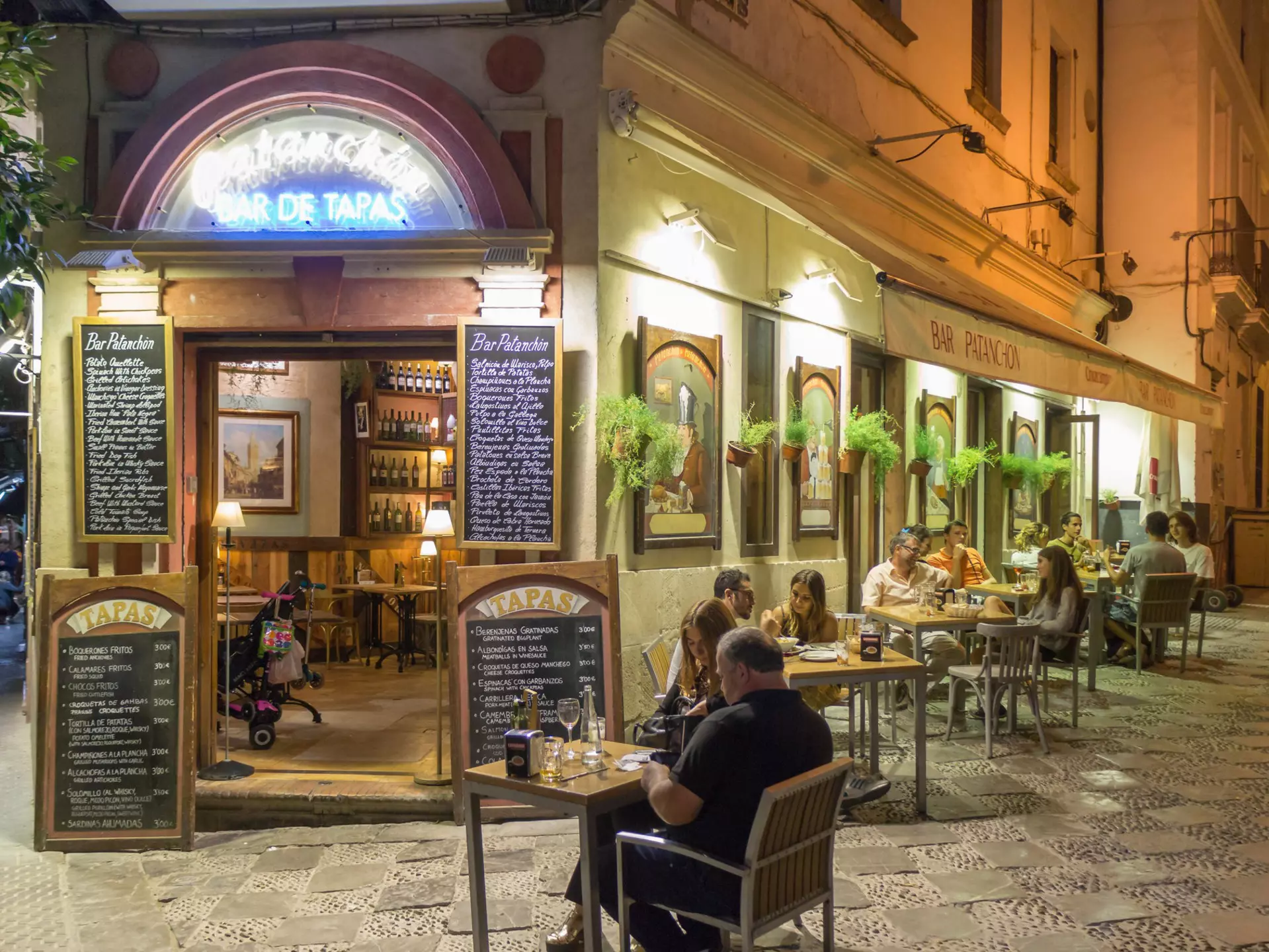 Spain in summer is all about outdoor eating and drinking especially in places like old Seville.