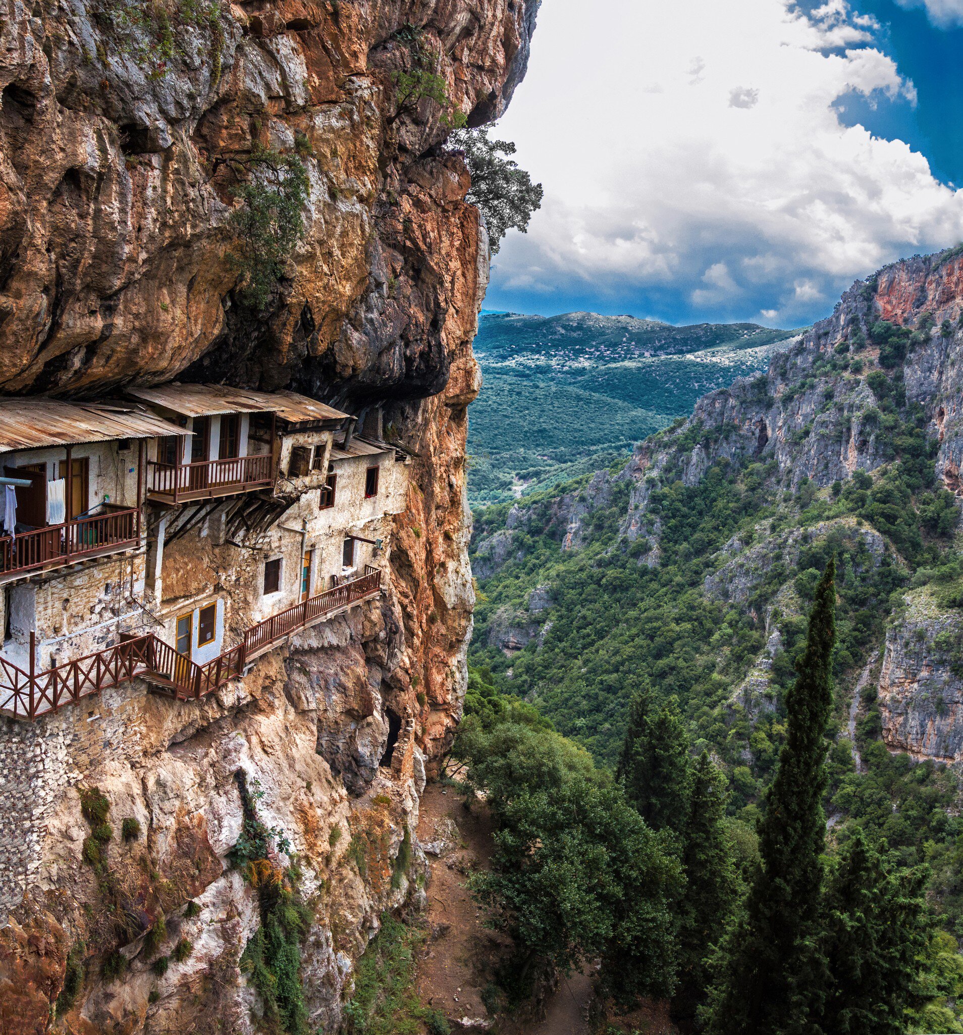 View of the cliffside Prodromos Monastery in Greece.