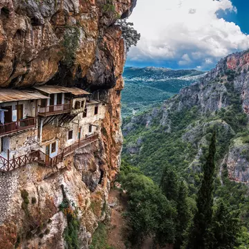 View of the cliffside Prodromos Monastery in Greece.