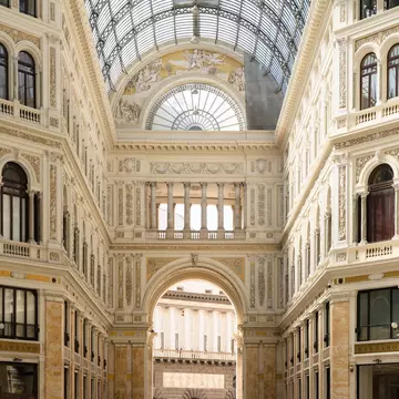 Interior view of the Galleria Umberto I, a historic public shopping gallery in Naples, Italy.