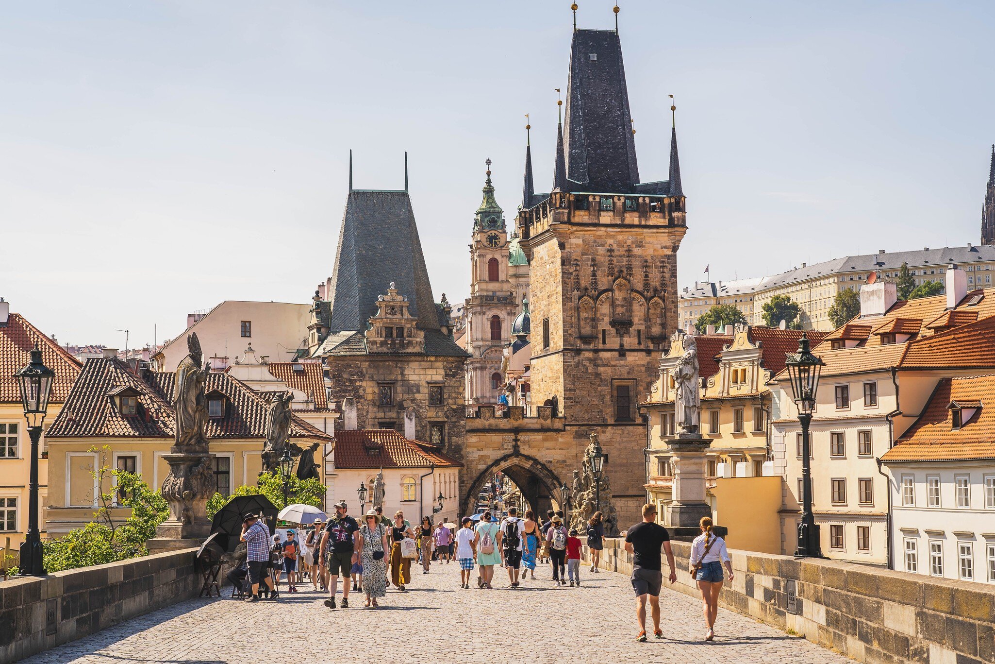 Tourists on the Mala Strana Bridge Tower in Prague, Czech Republic.
