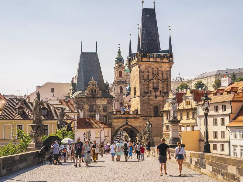 Tourists on the Charles Bridge in Prague on a sunny day