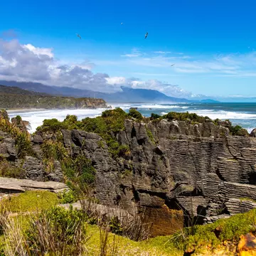 panorama of famous pancake rocks and blowholes track in paparoa national park, west coast of new zealand south island, License Type: media, Download Time: 2025-05-28T10:03:56.000Z, User: lonelyplanetmedia, Editorial: false, purchase_order: 65050 - Digital Destinations and Articles, job: Global Publishing WIP, client: Global Publishing WIP, other: Peterson Haggarty // SS Comp Ingestion