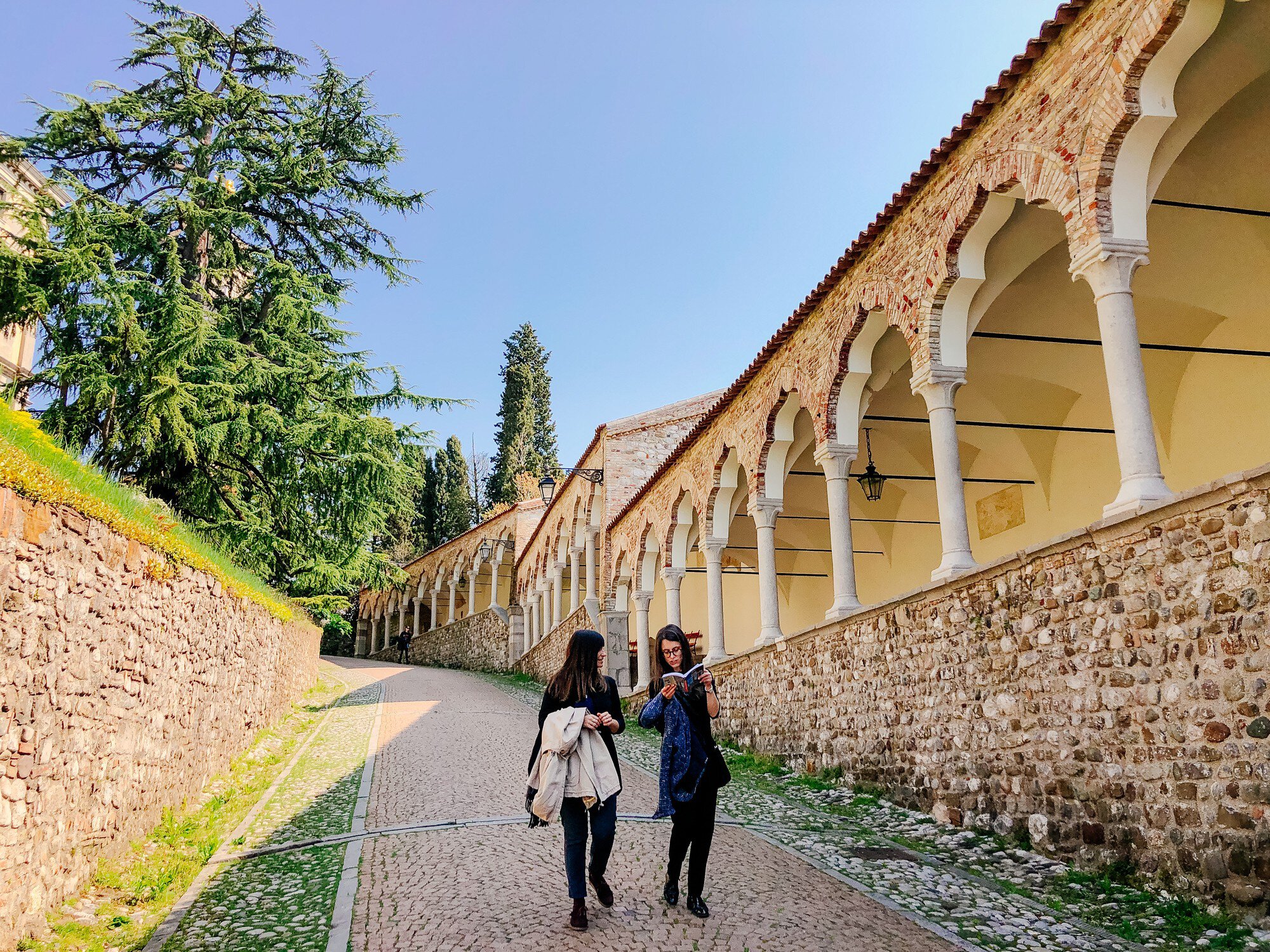 Europe, Italy, Friuli-Venezia-Giulia. Women walking in the patio near the arcades of the Piazzale del Castello in Udine.
1152464159
piazzale