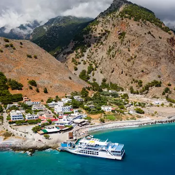  Aerial view of the village of Agia Roumeli at the exit of the Samaria Gorge on the Greek island of Crete.