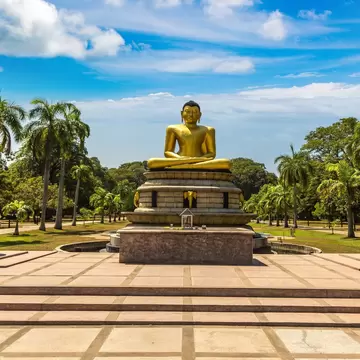Giant seated Buddha in the Viharamahadevi park in Colombo, Sri Lanka.