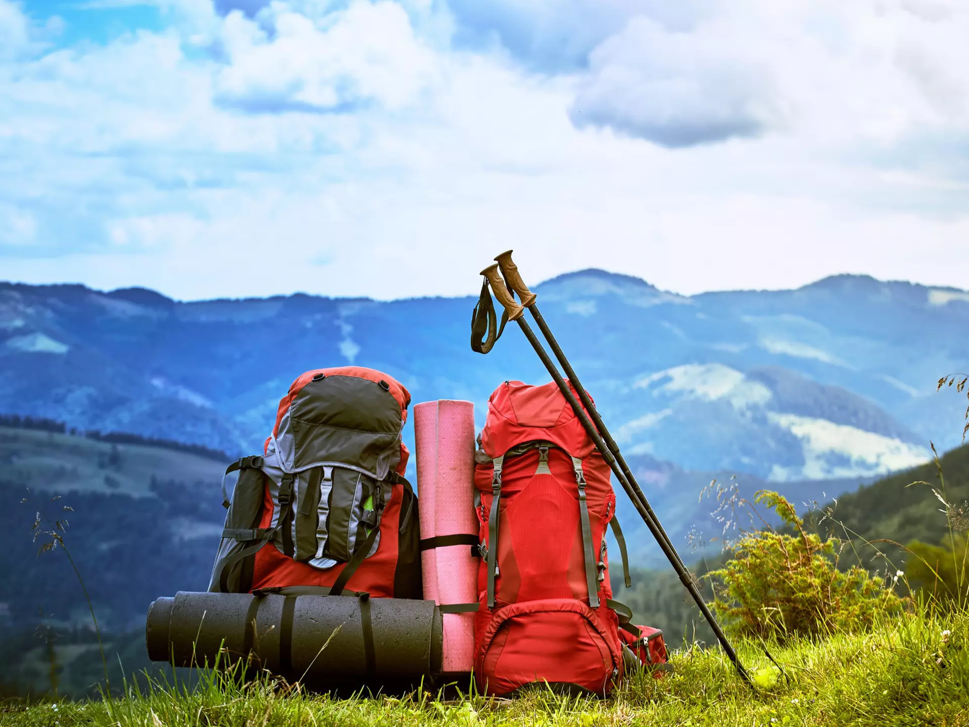 Backpacks on a hillside. trek6500/Shutterstock
