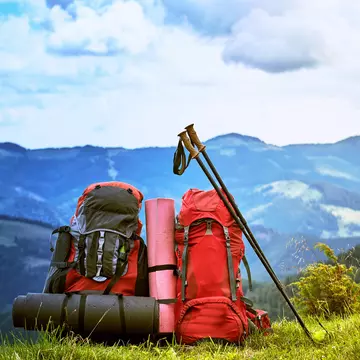 Backpacks on a hillside. trek6500/Shutterstock