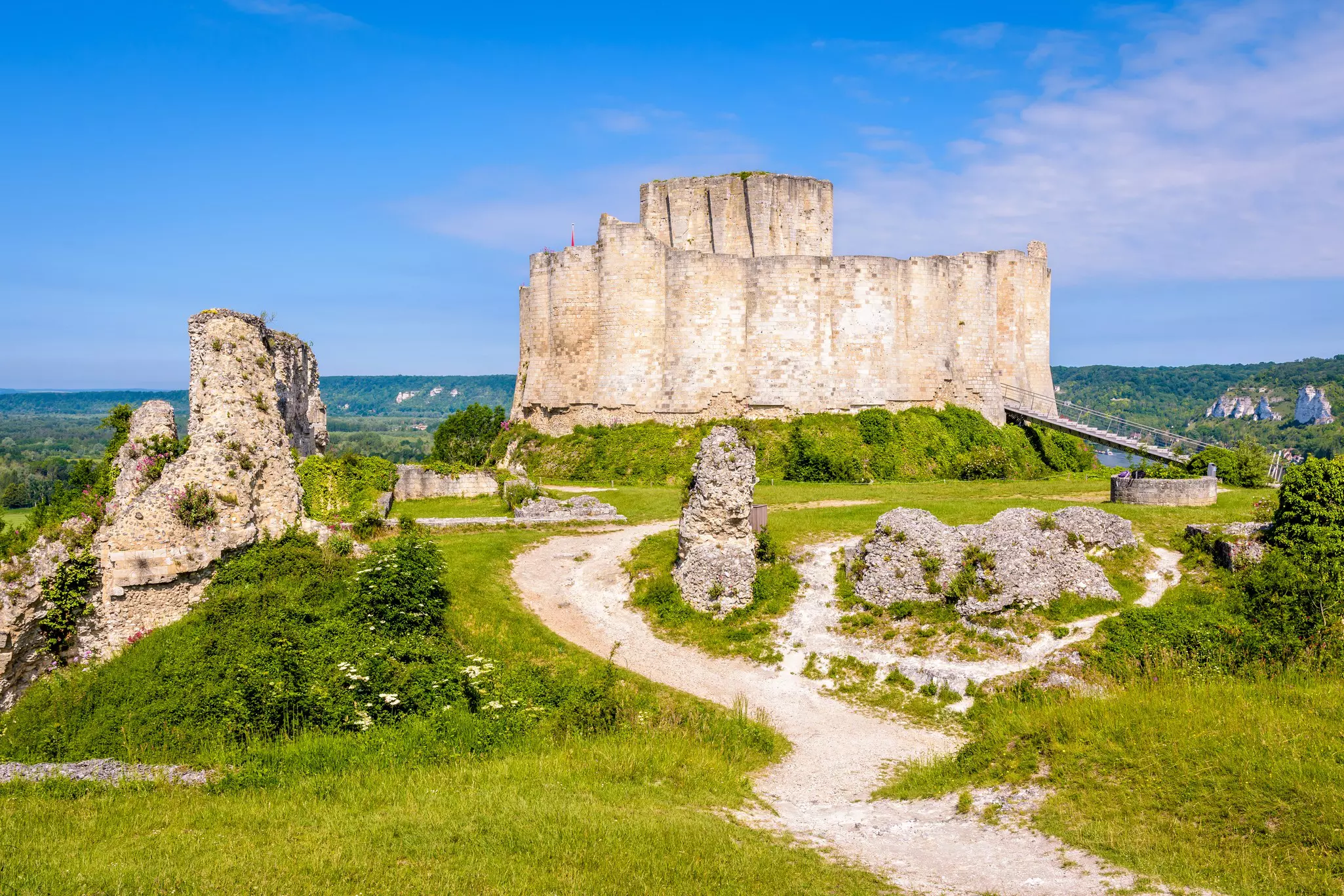 Les Andelys, France - June 6, 2021: The inner wall and keep of Château-Gaillard medieval fortified castle, built in Normandy by Richard the Lionheart in the 12th century, seen from the barbican.