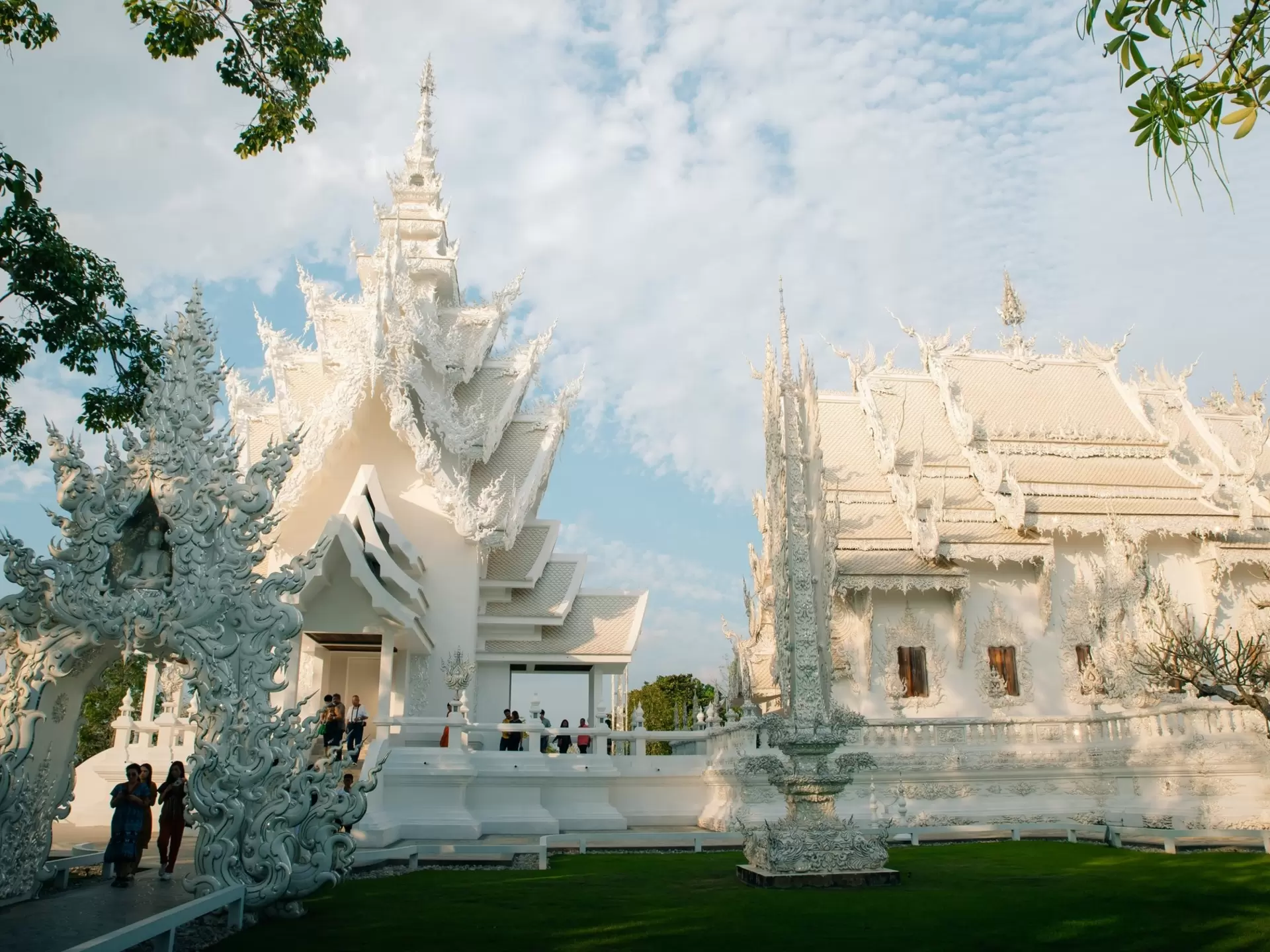 A white temple structure with a many-tiered roof.