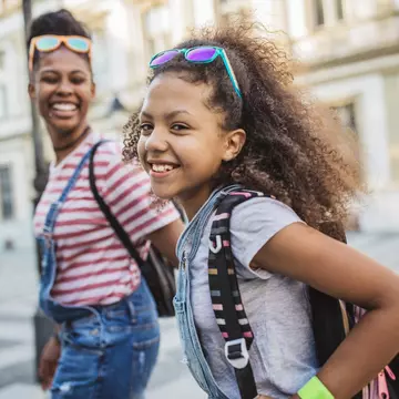 Mother and daughter on Paris street