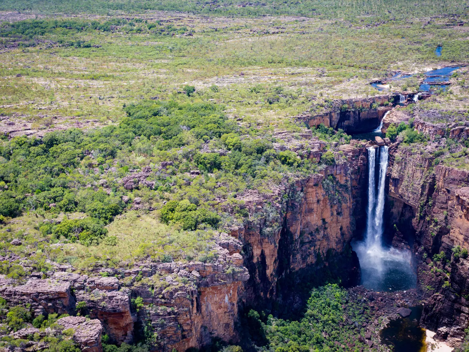 Jim Jim Falls from above, Kakadu. Top End, Northern Territory, Australia  License Type: media  Download Time: 2024-04-09T02:29:47.000Z  User: dermothegarty77  Is Editorial: No  purchase_order:   