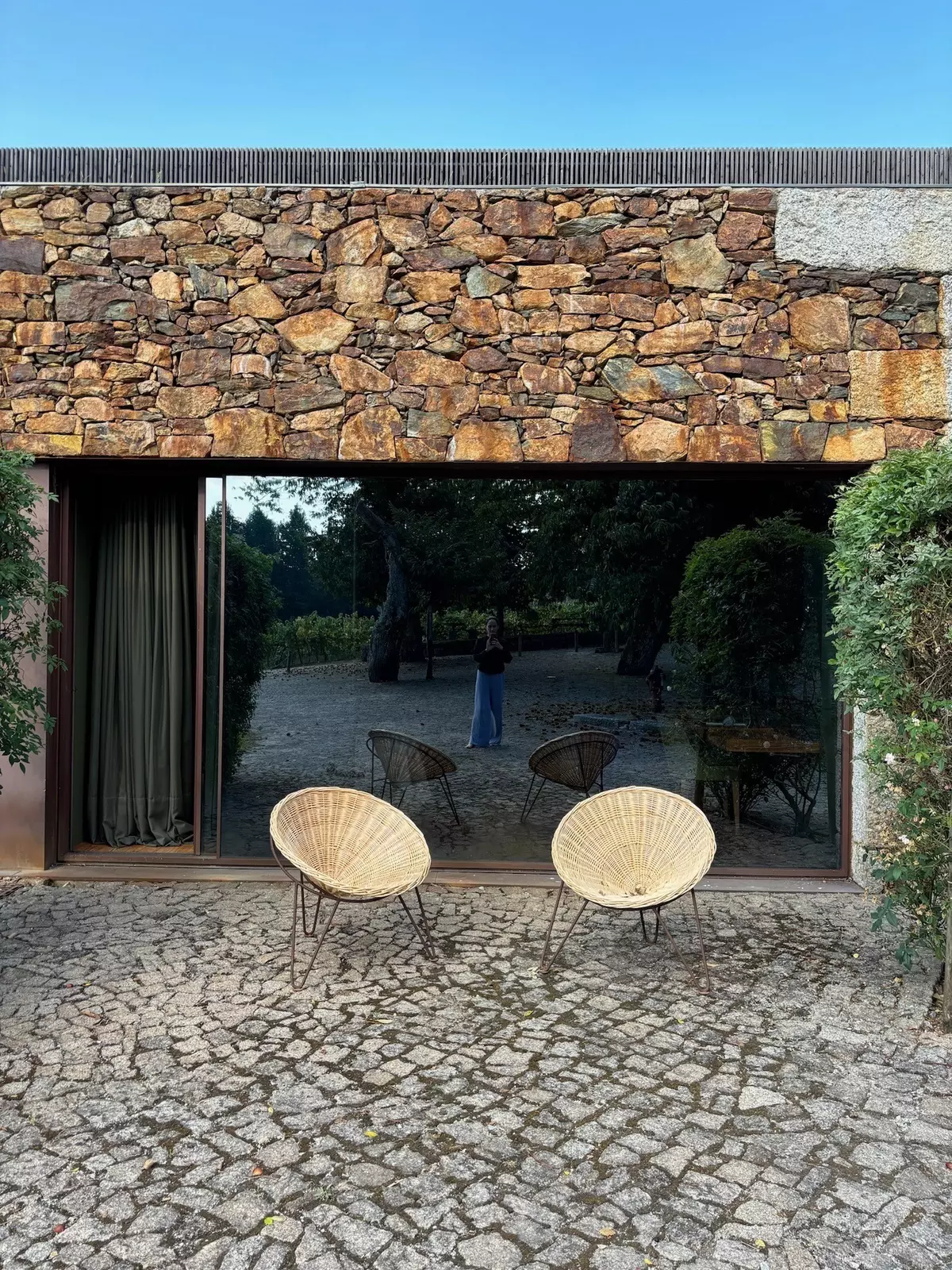 An outdoor seating area on the hotel patio. 