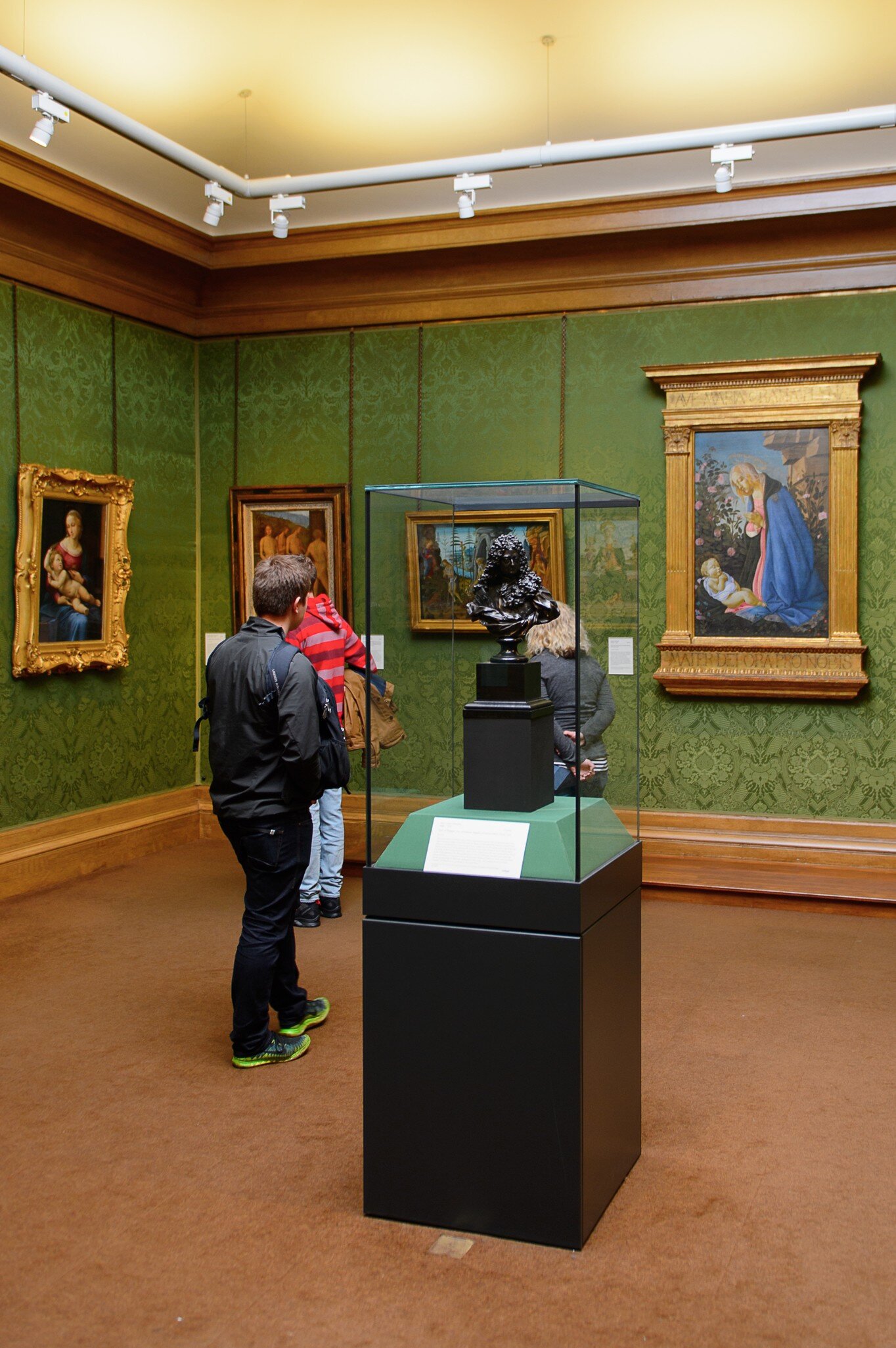Visitors studying the exhibits within the Scottish National Gallery, Edinburgh.