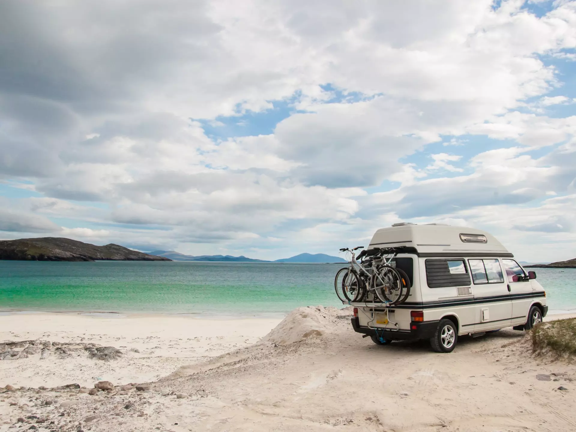 The green waters and cream-coloured sands on the island of Lewis can make you stop in your tracks. DrimaFilm / Shutterstock