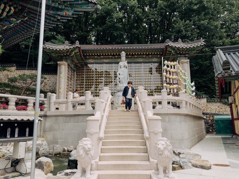 Dobong-gu, Seoul, Korea. July 2026. Visitors in the Dobongsan Cheonchuksa Temple.