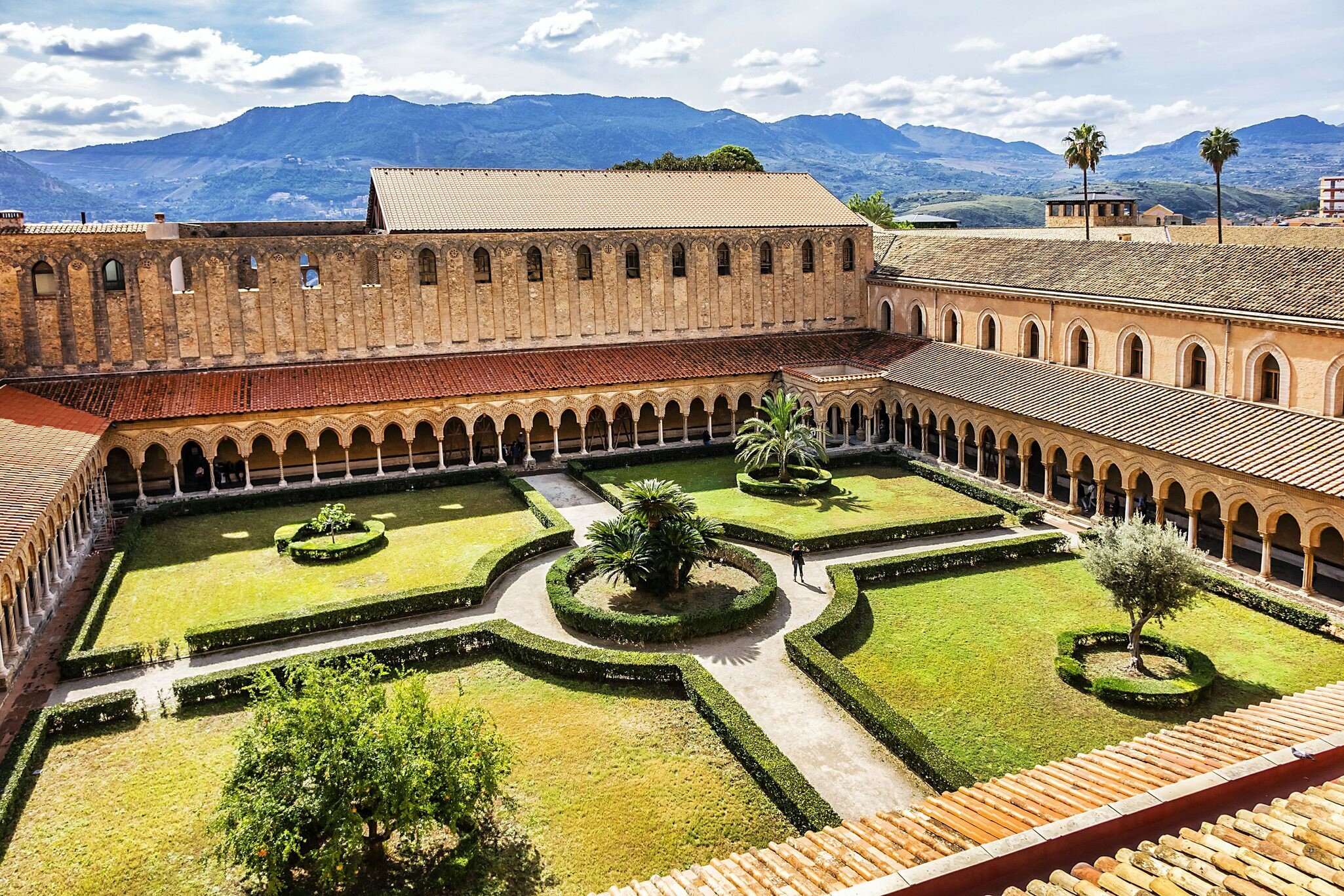 MONREALE, SICILY, ITALY - SEPTEMBER 28, 2018: Cloister of Roman Catholic Cathedral of Monreale (or Duomo di Monreale, 1267) near Palermo; one of the greatest extant examples of Norman architecture.; 
Cattedrale di Monreale

Shutterstock ID 1421721...
