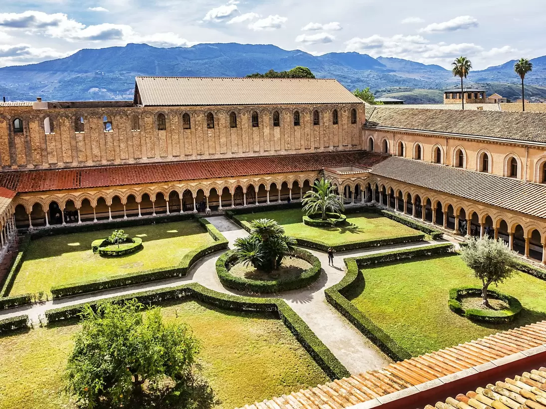 MONREALE, SICILY, ITALY - SEPTEMBER 28, 2018: Cloister of Roman Catholic Cathedral of Monreale (or Duomo di Monreale, 1267) near Palermo; one of the greatest extant examples of Norman architecture.; 
Cattedrale di Monreale

Shutterstock ID 1421721...