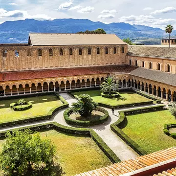 MONREALE, SICILY, ITALY - SEPTEMBER 28, 2018: Cloister of Roman Catholic Cathedral of Monreale (or Duomo di Monreale, 1267) near Palermo; one of the greatest extant examples of Norman architecture.; 
Cattedrale di Monreale

Shutterstock ID 1421721...