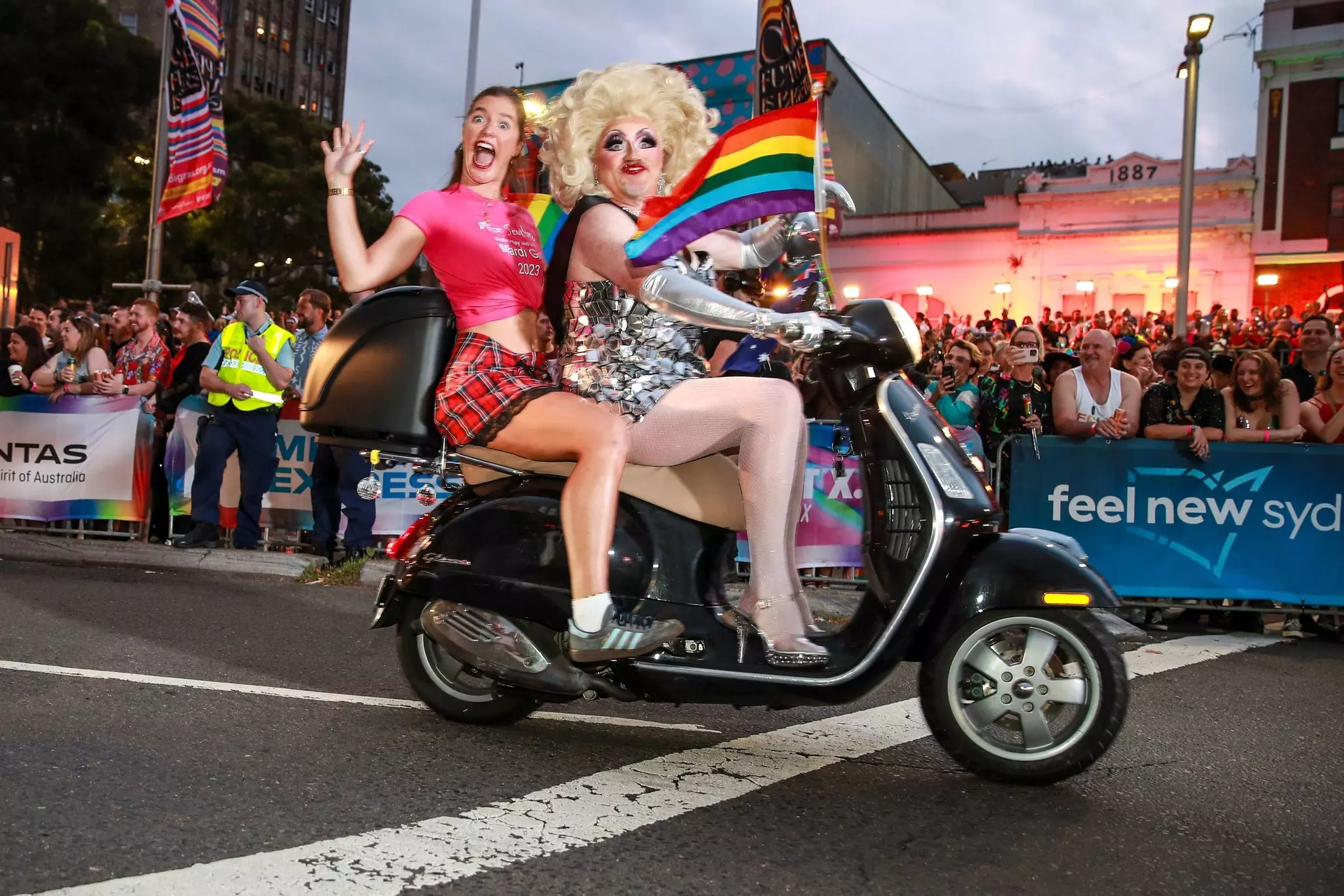 A drag queen and passenger on a motorcycle at Sydney Gay & Lesbian Mardi Gras, Sydney, New South Wales, Australia.
