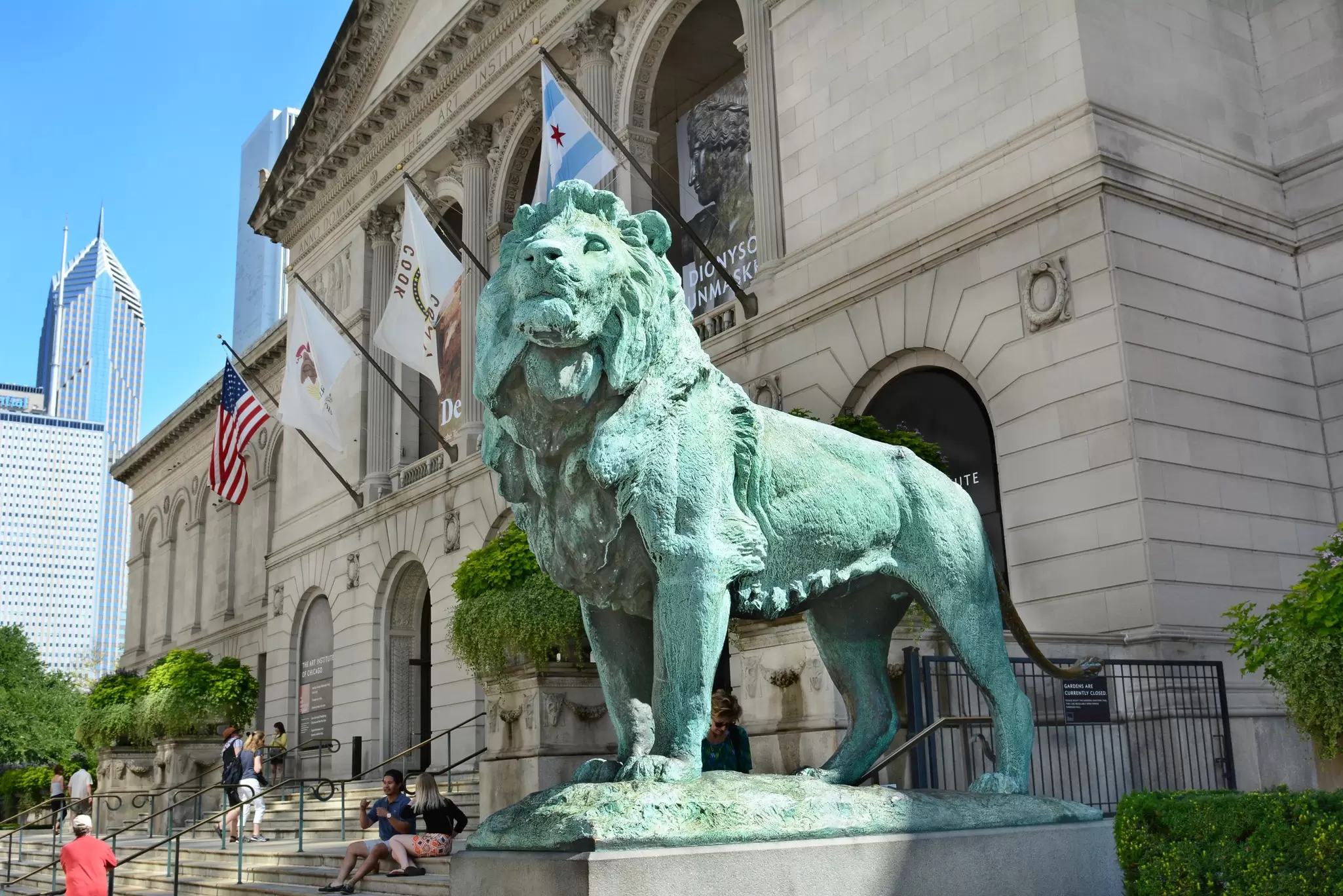A pair of bronze lions by sculptor Edward Kemeys flank the main entrance of The Art Institute of Chicago. Steve Cukrov/Shutterstock