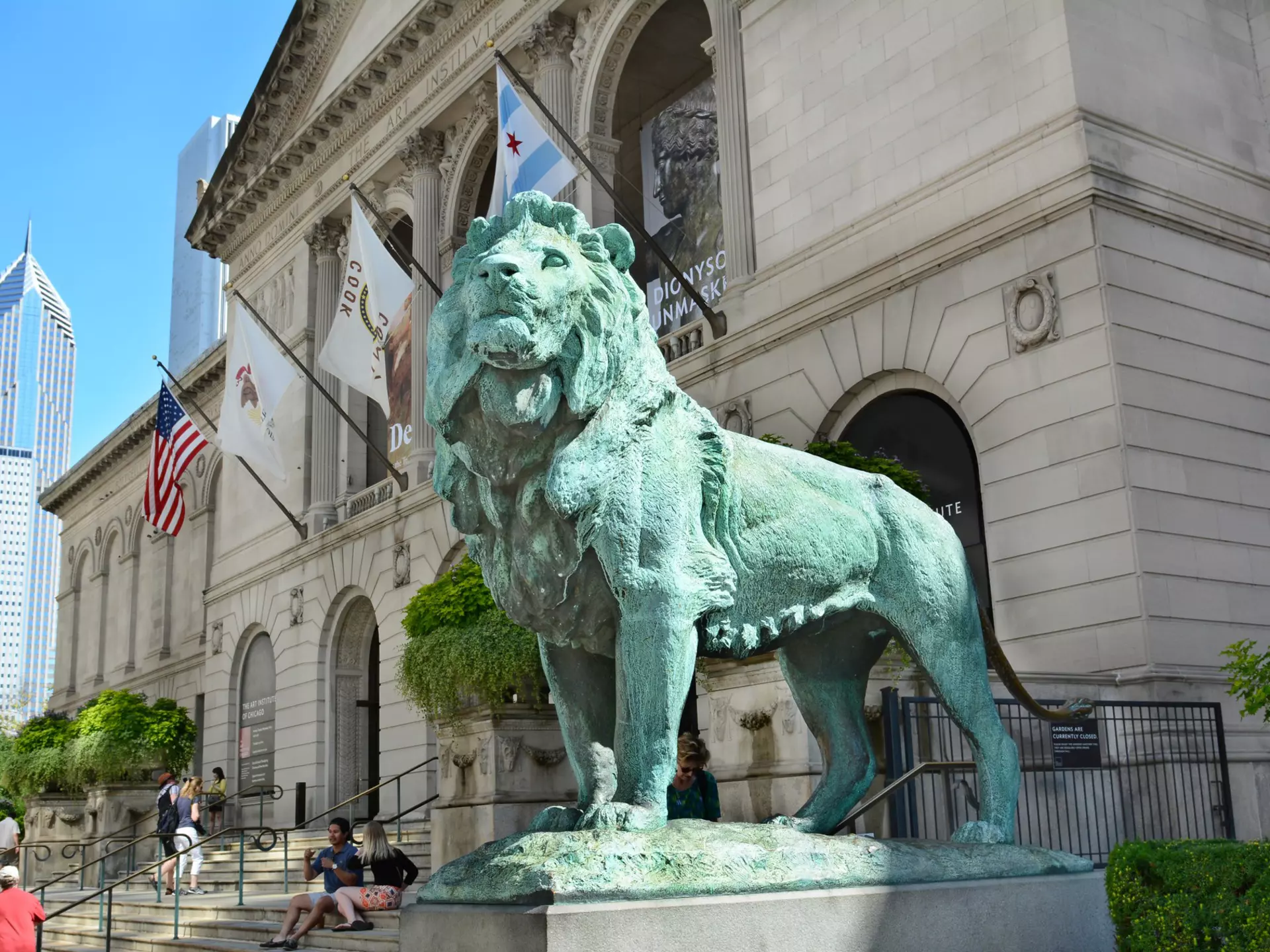 A pair of bronze lions by sculptor Edward Kemeys flank the main entrance of The Art Institute of Chicago. Steve Cukrov/Shutterstock