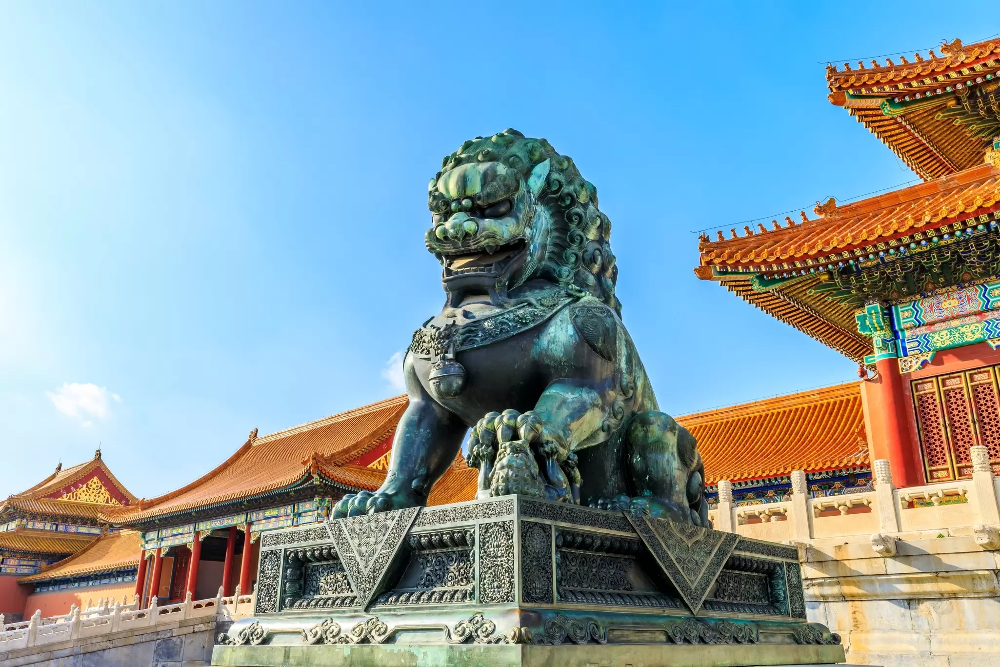 View of a bronze lion at the Forbidden City in Beijing, China.