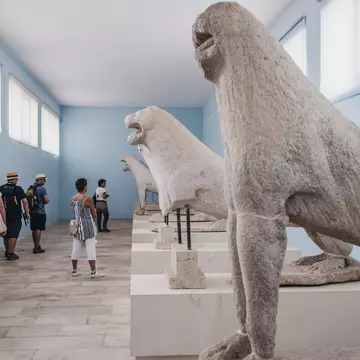 Delos, Greece-September 20,2019:Original Naxian Lions statues in the Archaeological Museum of Delos, a museum on the historic island of Delos, near Mykonos in the South Aegean, Greece. Selective focus; Shutterstock ID 1530866567; your: Erin Lenczy...